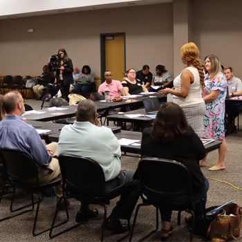 People participating in the opioid settlement strategy discussion